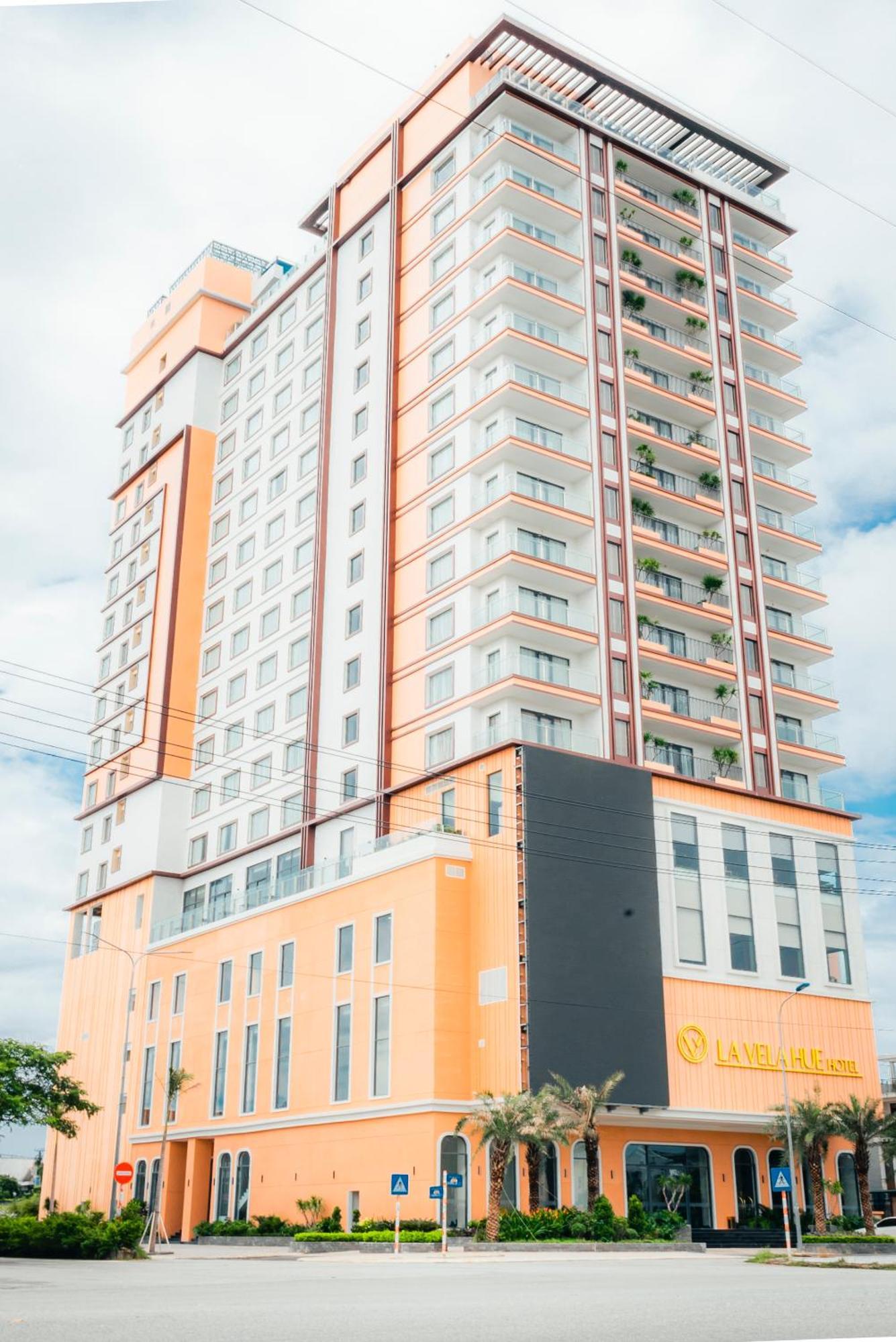 La Vela Hue Hotel Exterior photo Residential building in the city