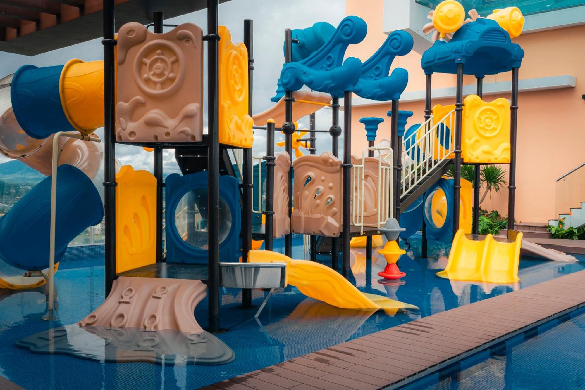 La Vela Hue Hotel Exterior photo Playground at the hotel
